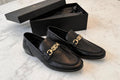 Black pebbled leather loafers with gold chain buckle-premium formal shoes for men